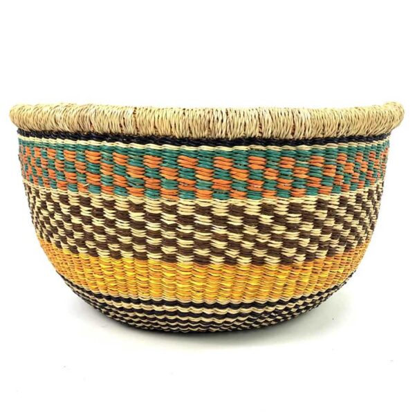 uba-basket-279-sahel-black-mustard-round-storage-african-bashiri-3 Front view of the round Bolga storage basket with a black and natural check, a mustard band and a teal and orange rim band, with no handles on a white background