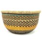 Front view of the round Bolga storage basket with a black and natural check, a mustard band and a teal and orange rim band, with no handles on a white background