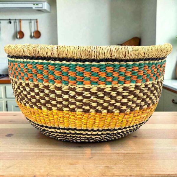 uba-basket-279-sahel-black-mustard-round-storage-african-bashiri-main Round Bolga storage basket with a black and natural check, a mustard band and a teal and orange rim band, with no handles