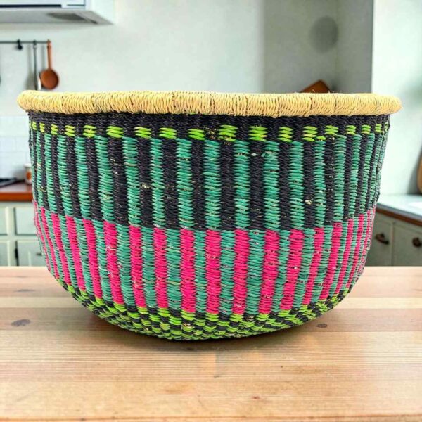uba-basket-282-ariel-teal-pink-round-storage-african-bashiri-main Round Bolga storage basket with teal, navy and pink stripes and no handles