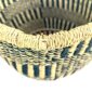 Close-up of the weak rim on the navy and natural round Bolga basket
