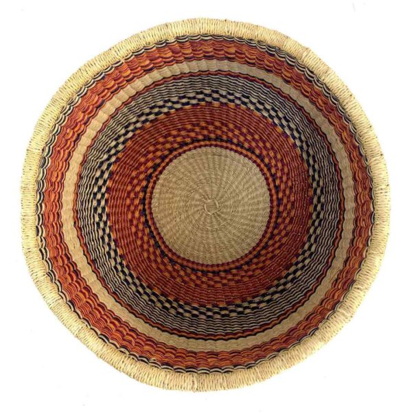 uba-basket-285-anzac-orange-black-vegan-woven-bolga-bashiri-2 Top-down view inside the orange and black round Bolga basket, showing the coiled base