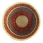 Top-down view inside the orange and black round Bolga basket, showing the coiled base