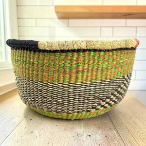 Round Bolga basket with no handles in olive and black, handwoven from elephant grass
