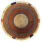 Top-down view inside the rust and black round Bolga basket, showing the coiled base