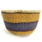 Front view of the yellow and purple round Bolga basket on a white background