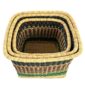 Top view of three Vounu square baskets nested inside each other, showing the woven rims and natural grass base.