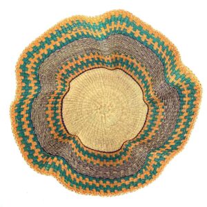 Top-down view inside the orange, teal and purple bolga wave basket, showing the coiled base