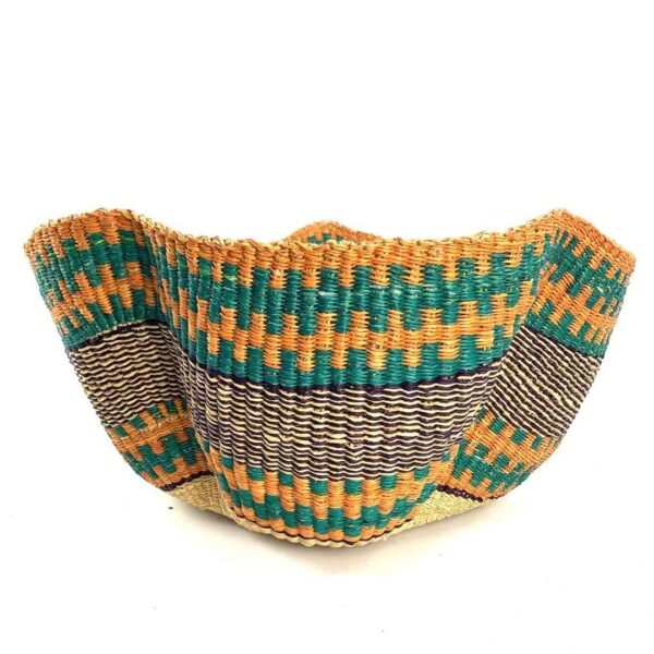 wave-basket-090-barrel-orange-teal-purple-bolga-handwoven-bashiri-3 Front view of the orange, teal and purple bolga wave basket on a white background