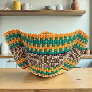 Bolga wave basket in orange, teal and purple, handwoven from elephant grass