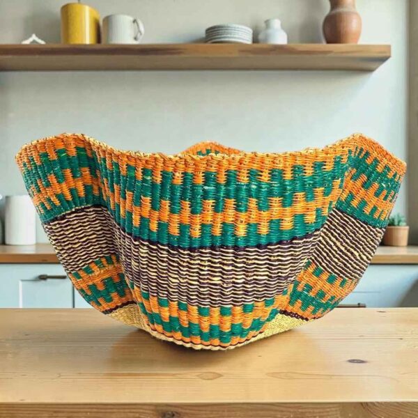 Bolga wave basket in orange, teal and purple, handwoven from elephant grass