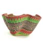 Front view of the pink and green bolga wave basket on a white background