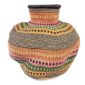 Front view of the rust, olive green and pink Bolga wave pot basket showing the woven neck