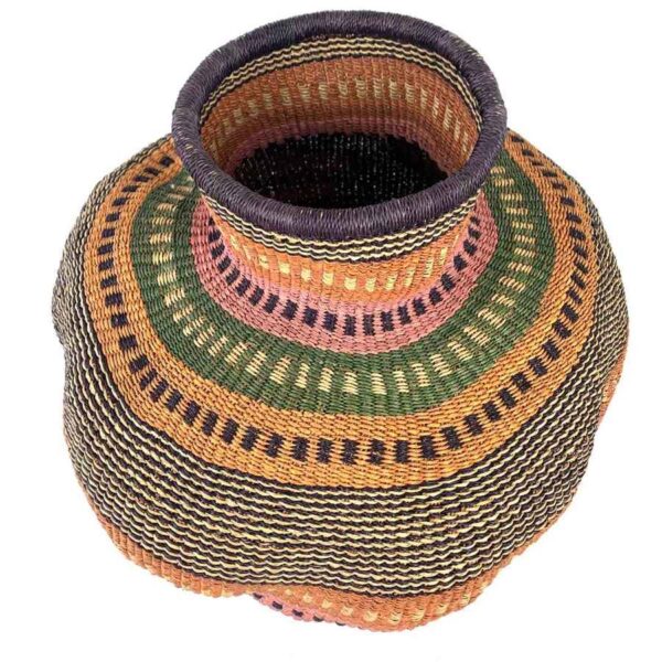 wavepot-003-lorikeet-3 Angled view of the rust, olive green and pink Bolga wave pot basket showing the wave pattern