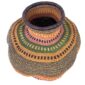 Angled view of the rust, olive green and pink Bolga wave pot basket showing the wave pattern