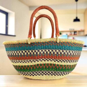 Mega Wawa basket with teal, rust, navy and green banded stripes, leather handles
