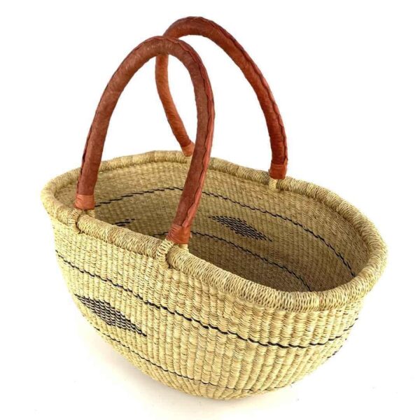 wawa-basket-259-sporty-2 Angled view of the natural Mega Wawa Bolga basket showing the woven interior and leather handles