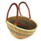 Angled view of the multicolour checked Mega Wawa Bolga basket showing the woven interior and leather handles