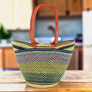 Long handle market basket with patterned bands in soft, cool tones and leather-wrapped handles