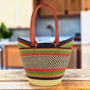 Long handle market basket with a dark chequered pattern with bright accent stripes and leather-wrapped handles