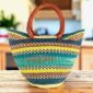 Extra large market basket, teal, mustard and brown stripes over natural straw, with leather handles