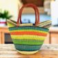 Extra large market basket, lime green, teal and orange stripes over natural straw, with slim leather handles
