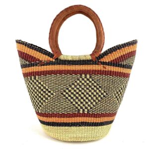 woven-market-basket-standard-541-kofi-bashiri-2 Front view of the classic market basket with warm, earthy stripes around a dark diamond pattern
