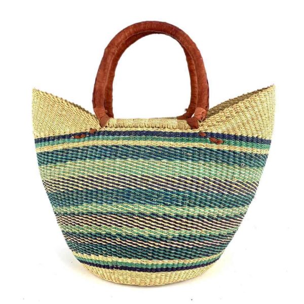 woven-market-basket-standard-543-binta-bashiri-2 Front view of the classic market basket with soft, cool-toned stripes below a natural rim